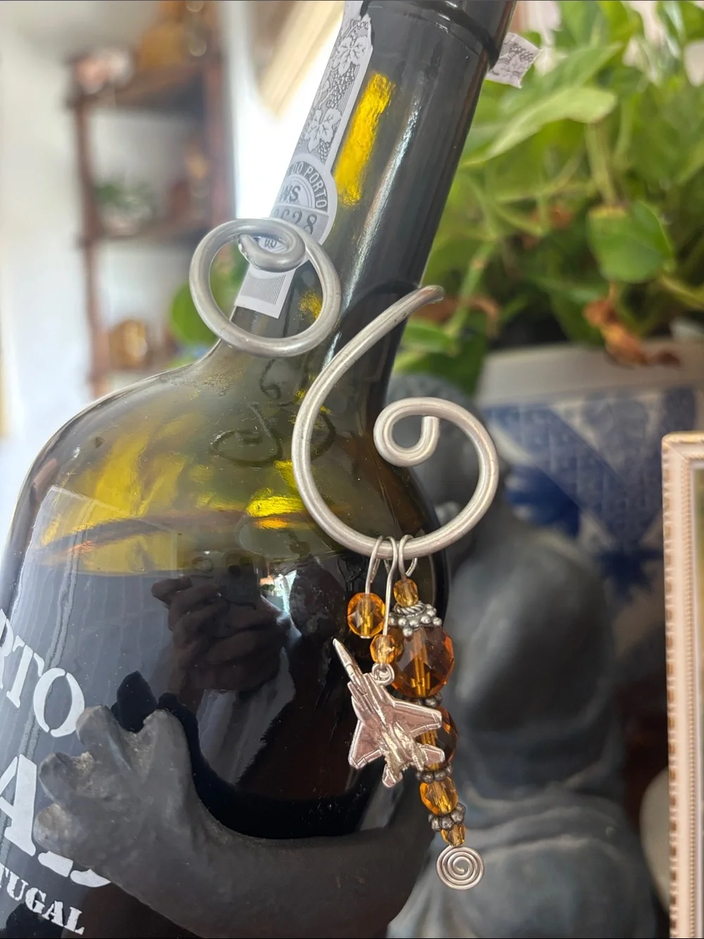 Sporto Silver-Tone Swirl Wine Charm with Amber Beads and Jet Plane
